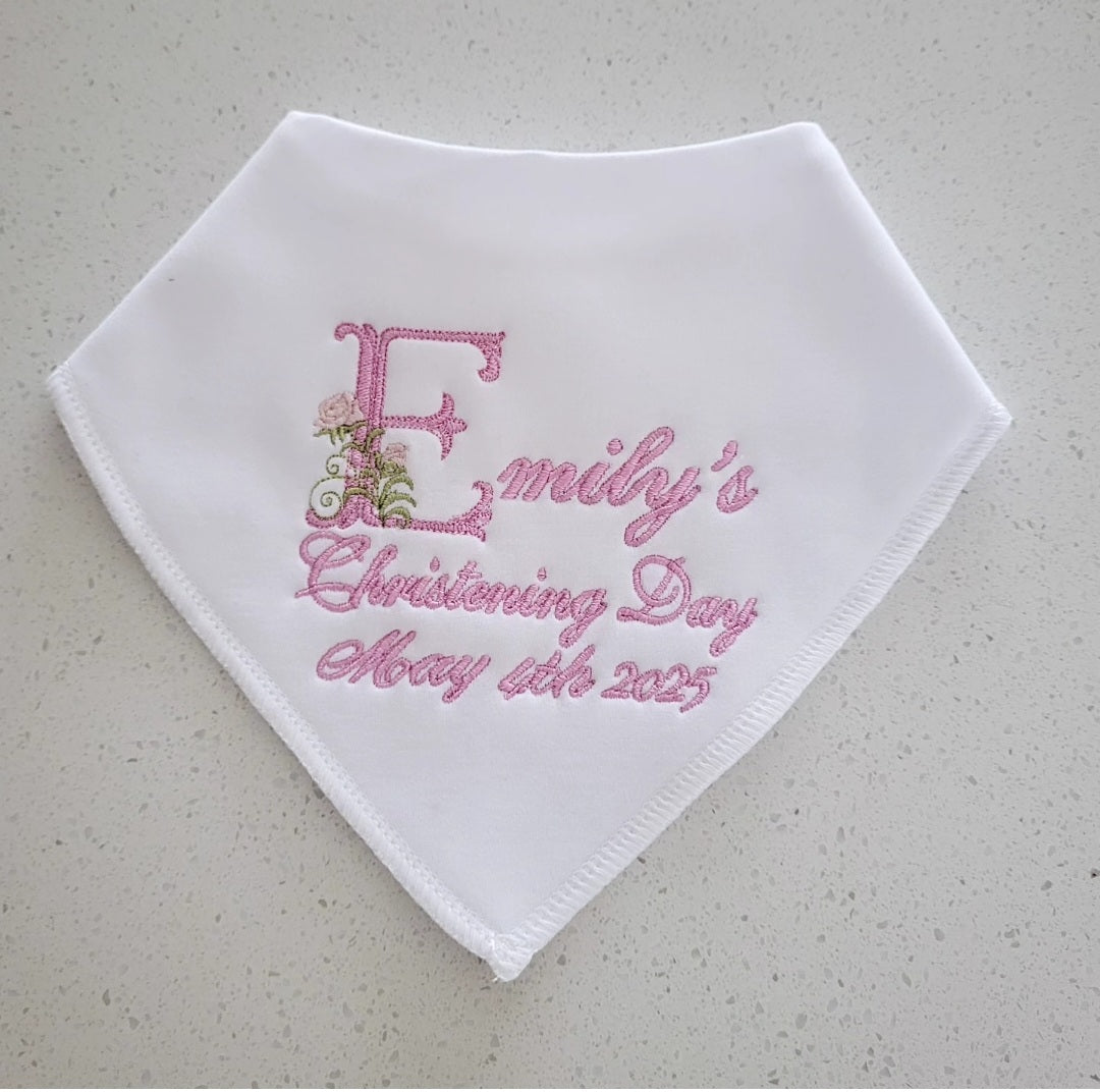 christening bib with floral detailing