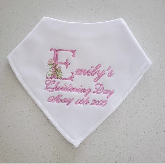 christening bib with floral detailing