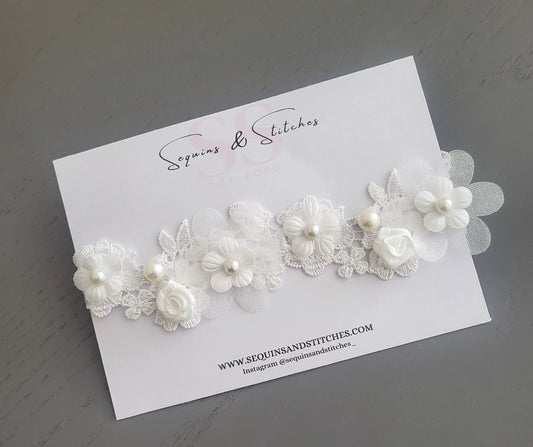 Elegant pearl embellished rose lace headpiece.