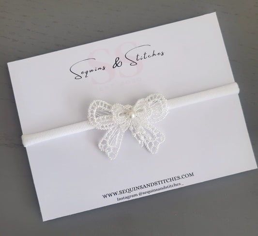 Embroidered white bow & pearl headpiece