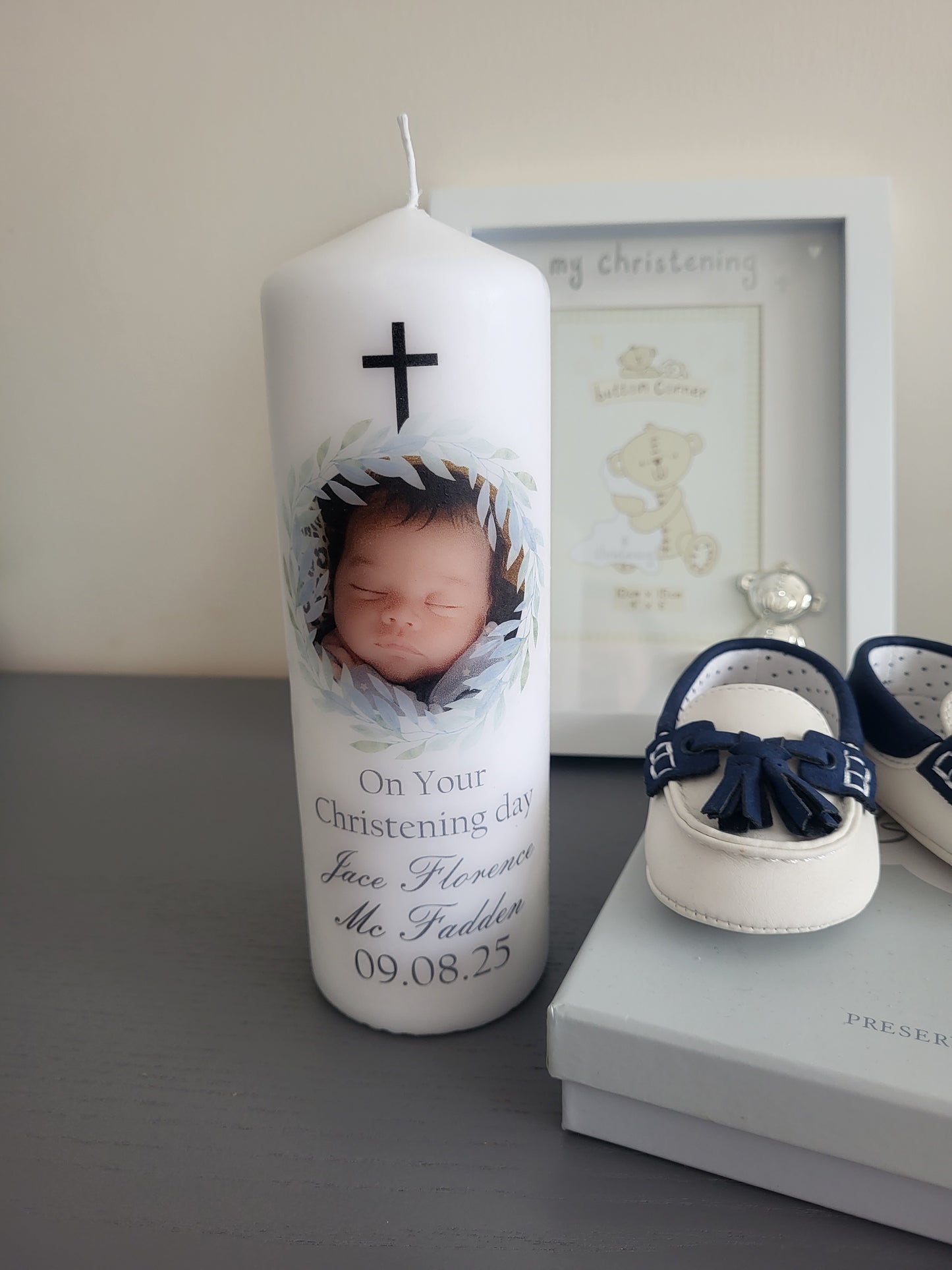 Christening candle blue wreath style.