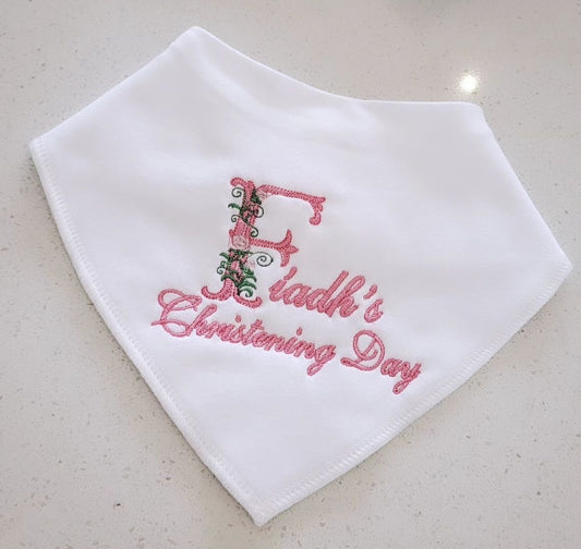 christening bib with floral detailing