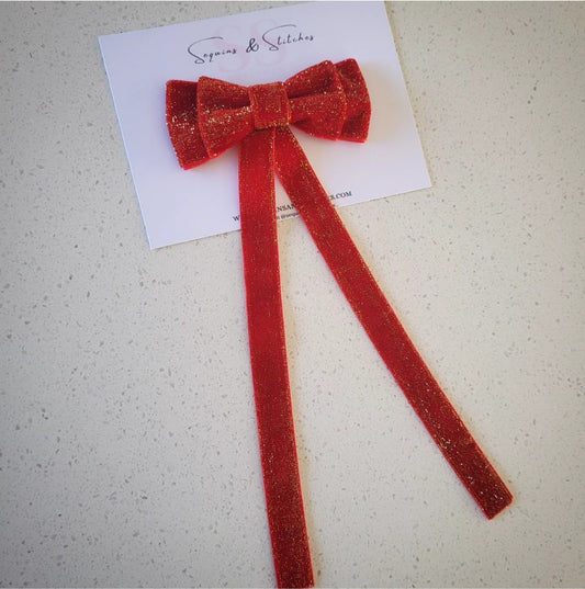 Red glitter velvet bow clip with tails