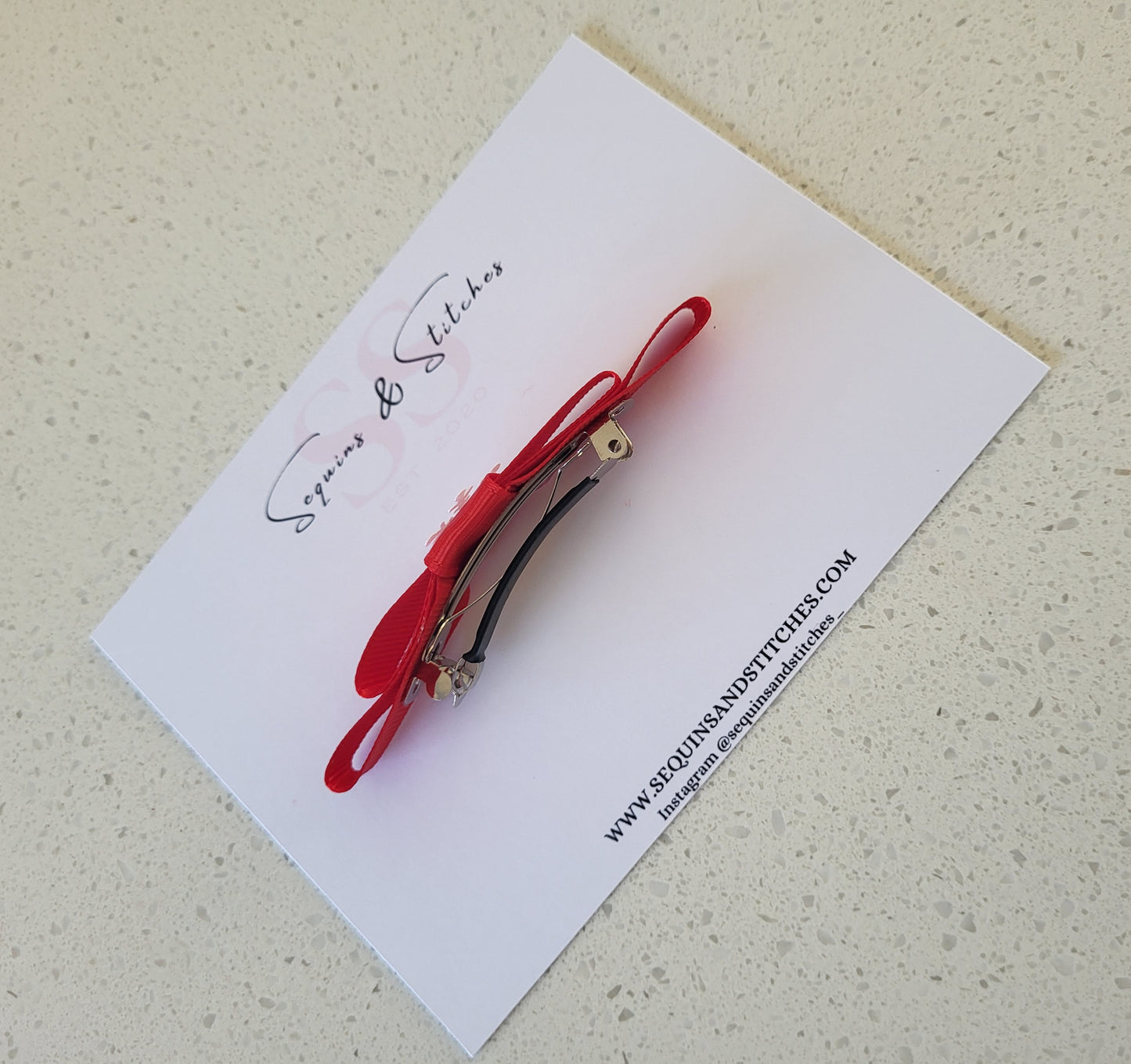 Red snowflake hair clip