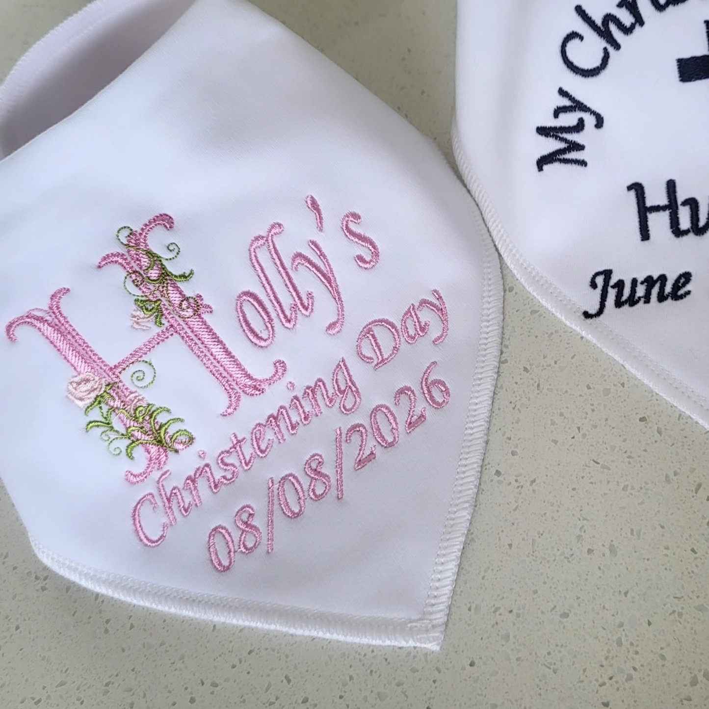 christening bib with floral detailing