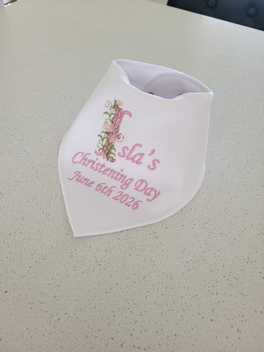 christening bib with floral detailing